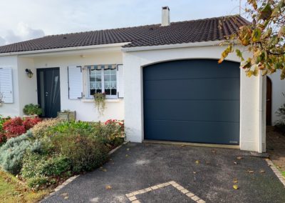 Porte de garage sectionnelle remplacée par Menuiserie MSB